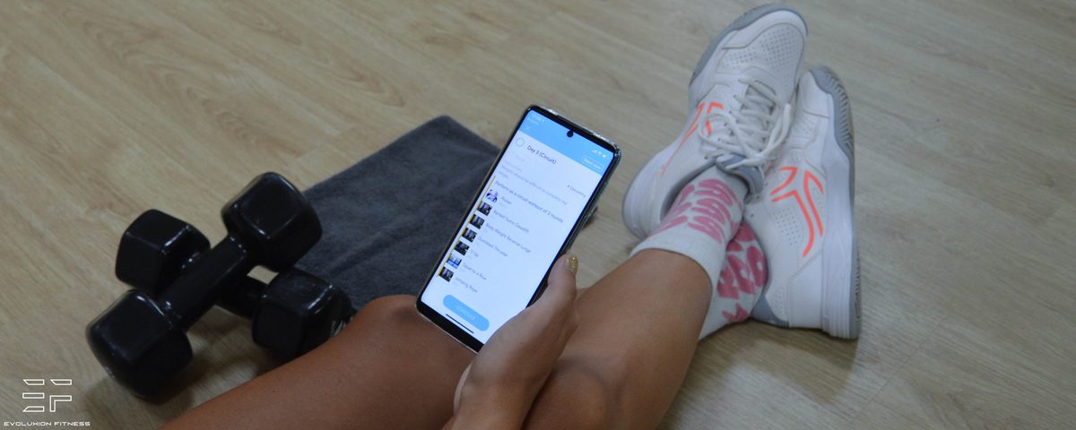Training equipment beside the EF Coaching app